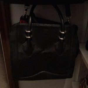 Carlos Santana purse